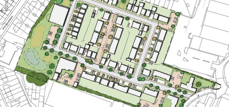 Site plan of a residential development, showing arranged buildings, green spaces, and roads within a neighborhood layout.